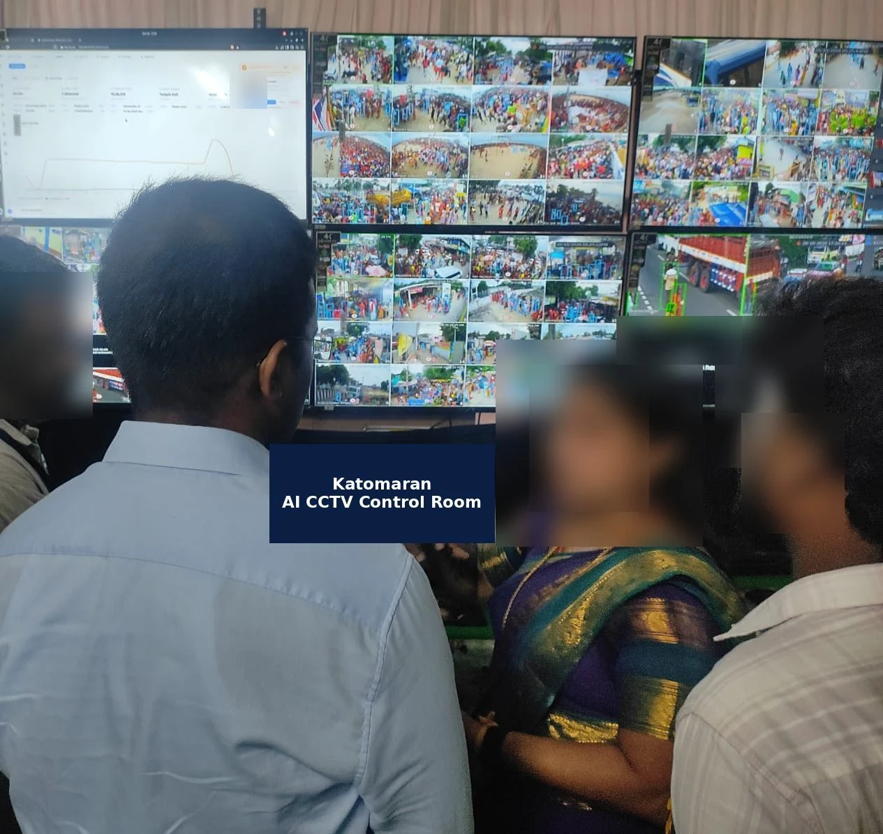 Officials briefed in front of the Katomaran video wall and live analytics dashboard